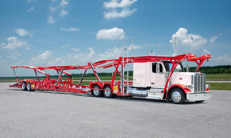 Peterbilt 589 with Cottrell car hauler trailer for auto transport